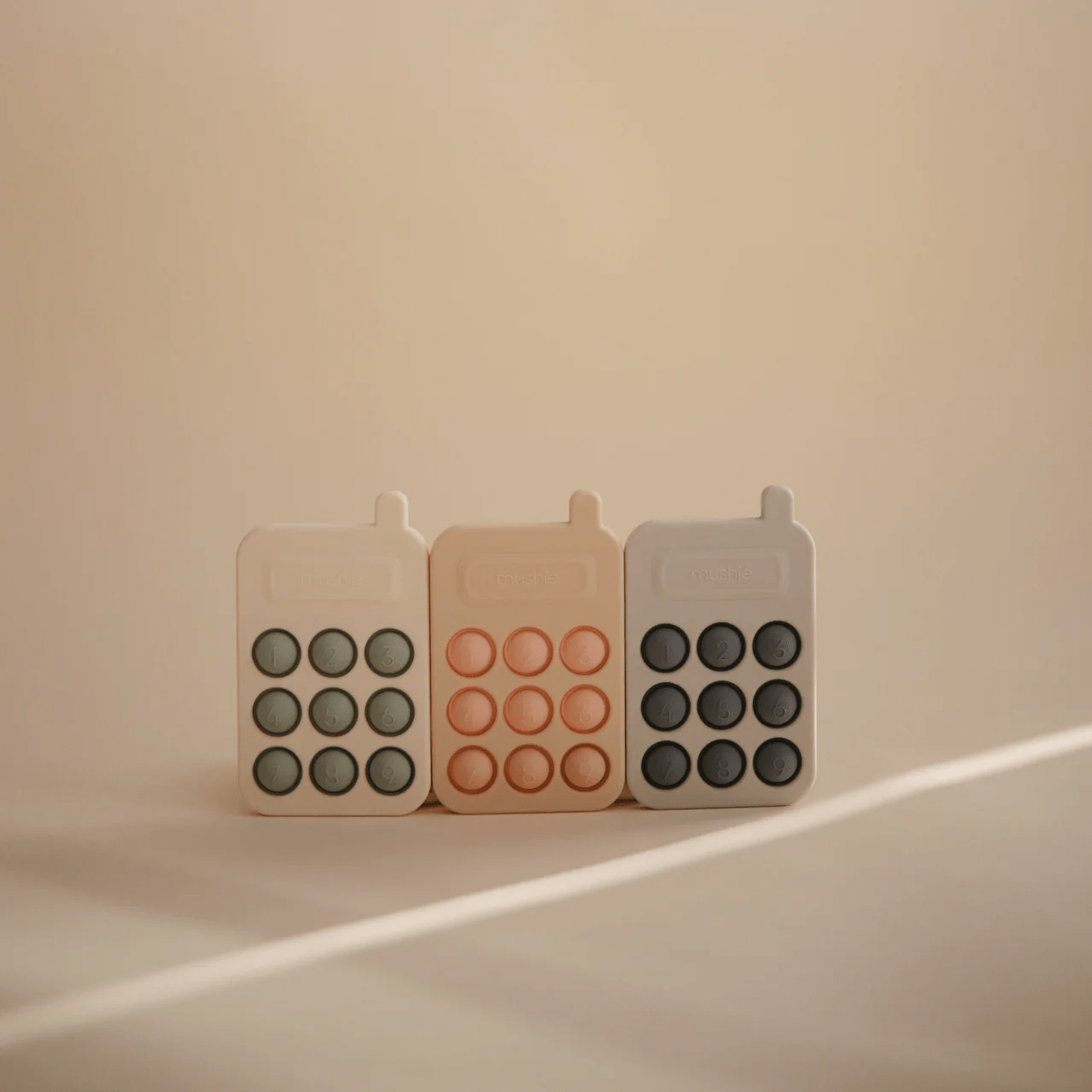 Mushie Phone Press Toy 12 Mushie Phone Press Toy